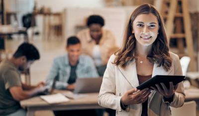 Office woman worker in a diverse office in ashburn virginia working on web development for Imageworks creative