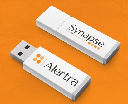 Alertra logo on thumb drive mock up